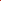 Red aluminum foil chocolate wrapper sheet, glossy surface, close-up detail